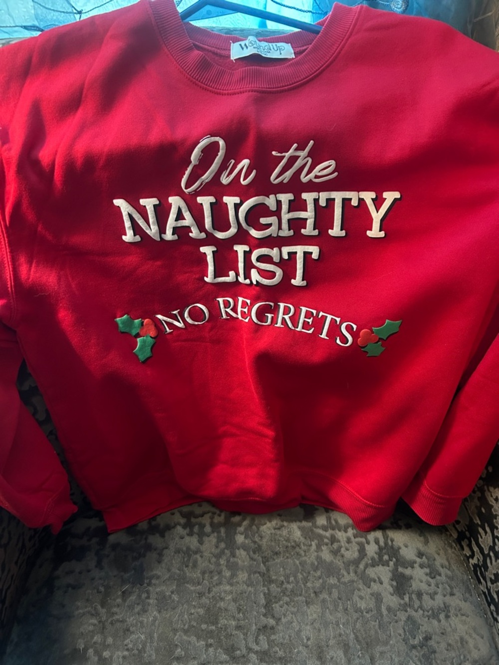 Wound Up Red Holiday Sweatshirt with White Embroidered Text